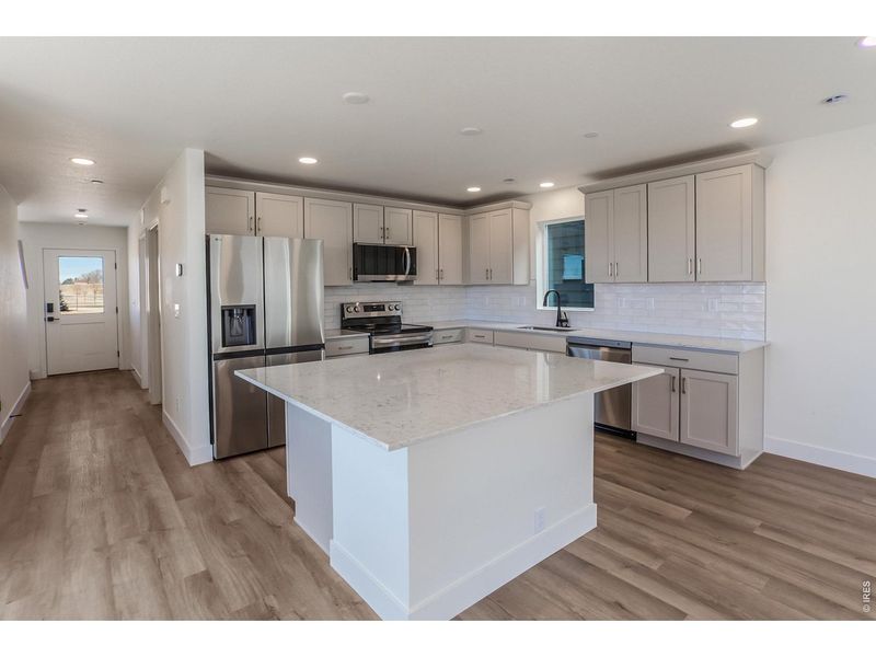 Furnished interior view inside a new home in Prairie Song Story Collection - Single Family Homes, Windsor (Image 12).