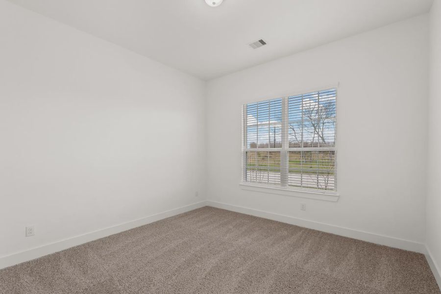 Representative unfurnished interior of a home built from the Mickelson by Chesmar Homes in Riceland Alley Loads, Mont Belvieu (Image 95).