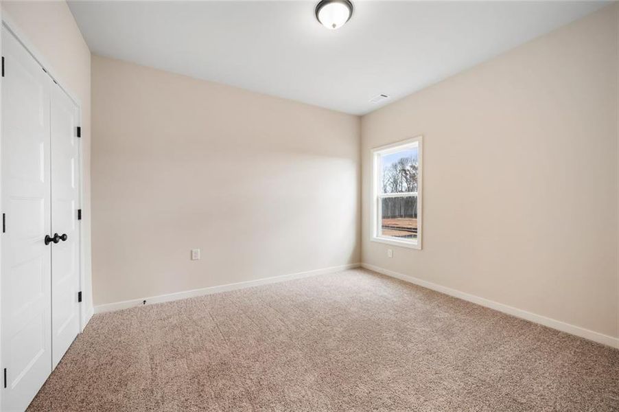 Spacious, unfurnished interior of a new home in Ponderosa Farms Manor, Gainesville (Image 32).