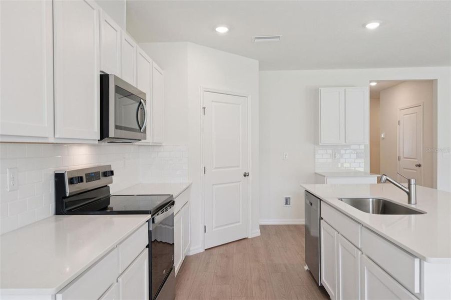 Furnished interior view inside a new home in , Daytona Beach (Image 14).