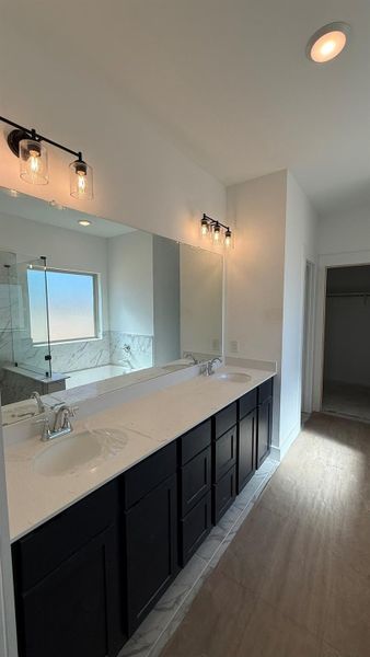 Escape to a serene retreat in this beautifully designed primary bath, crafted to balance modern luxury with calming comfort.