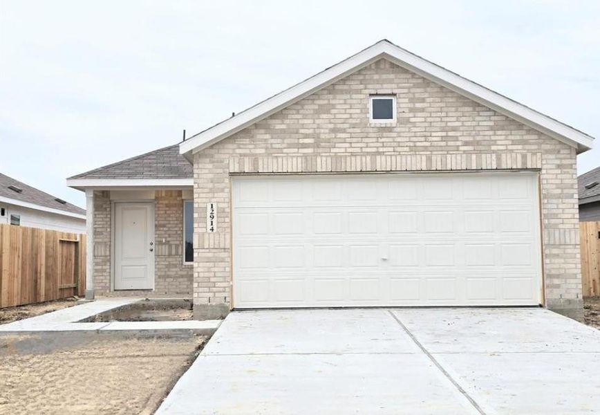 Exterior details and patio area of a home in Tavola: Cottage Collection, New Caney (Image 2).