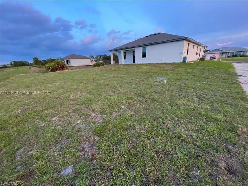 Exterior details and patio area of a home in , Lehigh Acres (Image 3).