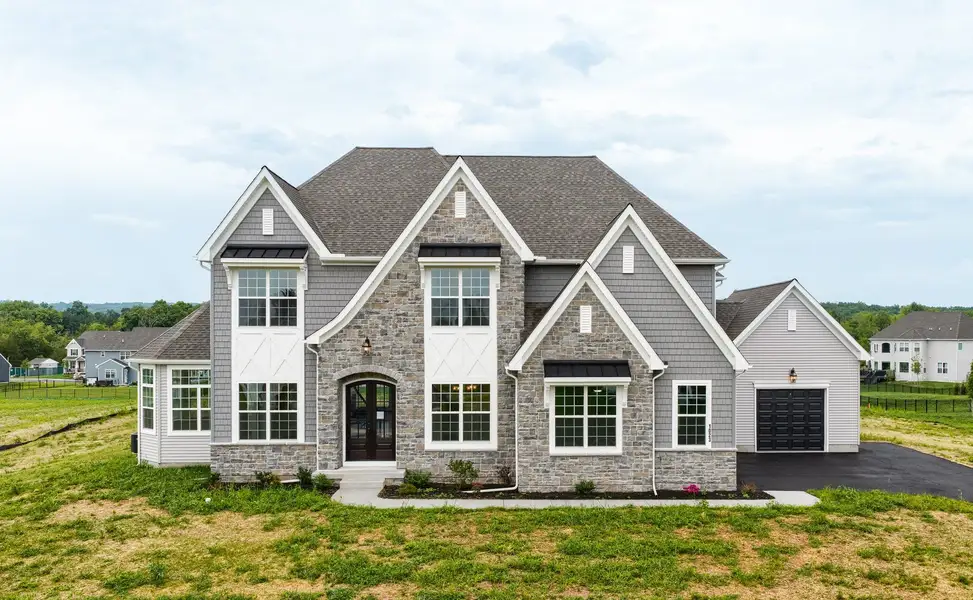 Representative exterior photo of a completed home built from the Devonshire by Keystone Custom Homes in Saluda Ridge, Piedmont, SC (Image 40).