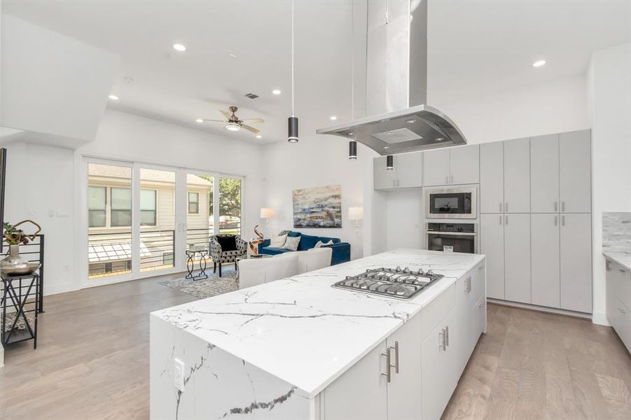 Expansive Kitchen Island Complete with a Built-In Microwave