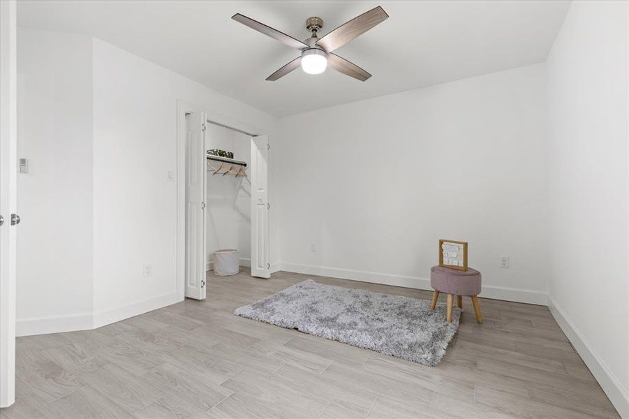 Secondary bedroom. Photo is from previous home built with similar finishes.