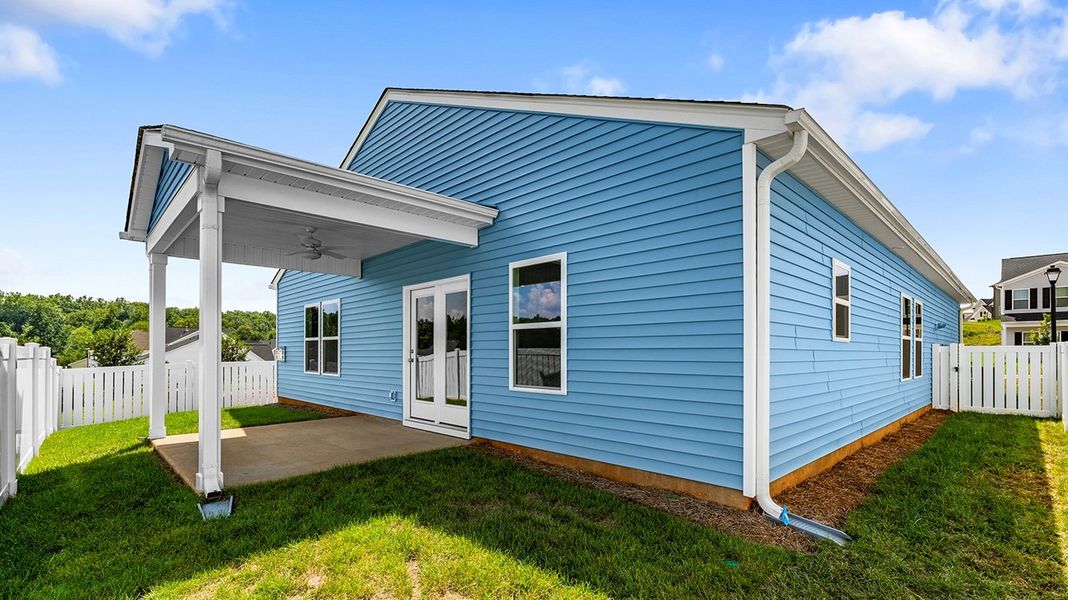 Front exterior of a new home in Hanes Lake, Winston-Salem, NC, highlighting curb appeal (Image 24). Front exterior of a new home in Hanes Lake, Winston-Salem, NC, highlighting curb appeal (Image 24).
