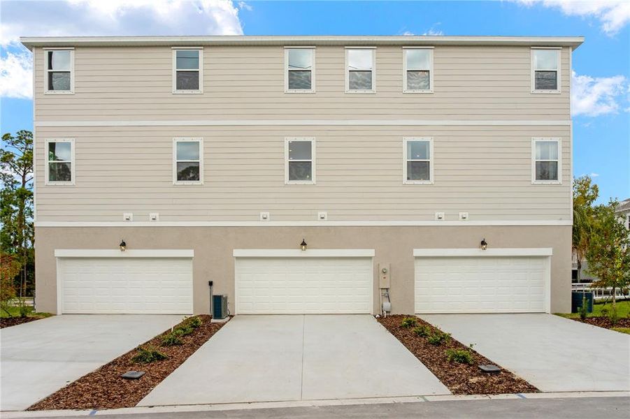 Front exterior of a new home in , Tampa, FL, highlighting curb appeal (Image 2). Front exterior of a new home in , Tampa, FL, highlighting curb appeal (Image 2).