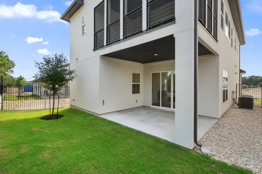 Front exterior of a new home in Foxfield, Austin, TX, highlighting curb appeal (Image 2).