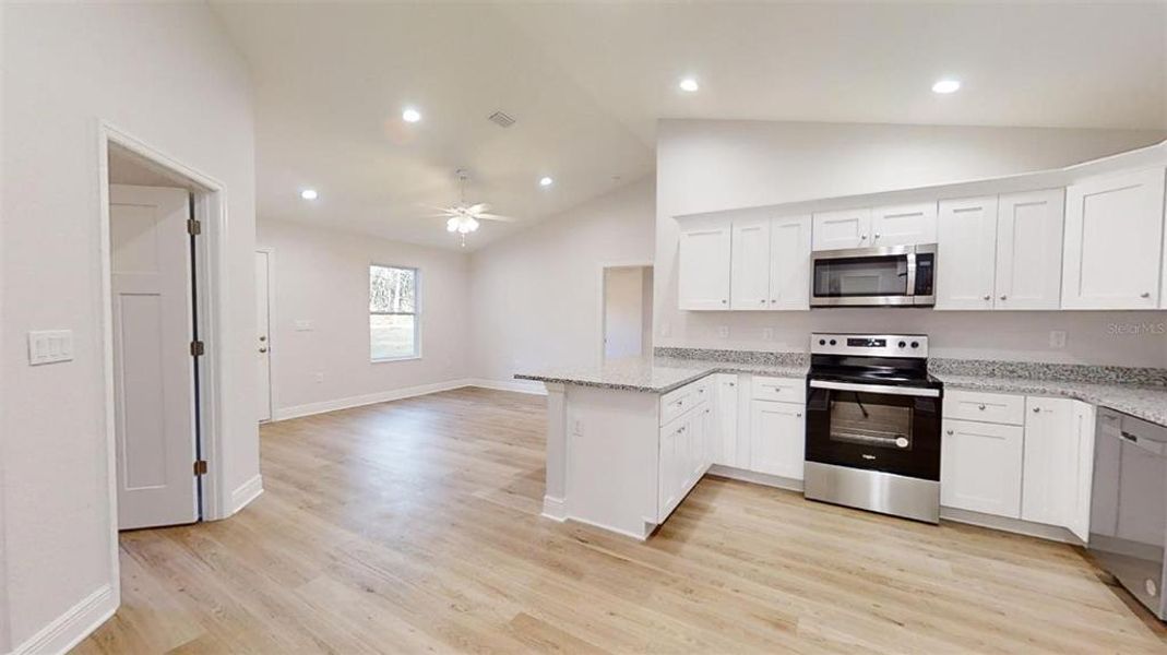 Furnished interior view inside a new home in , Dunnellon (Image 9).