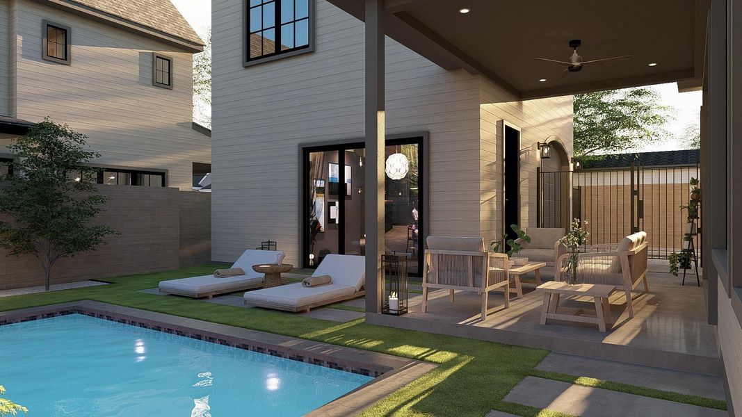 Back of house featuring ceiling fan and a patio