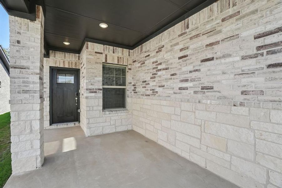 Exterior details and patio area of a home in Eastridge - Spring Series, McKinney (Image 3). Exterior details and patio area of a home in Eastridge - Spring Series, McKinney (Image 3).