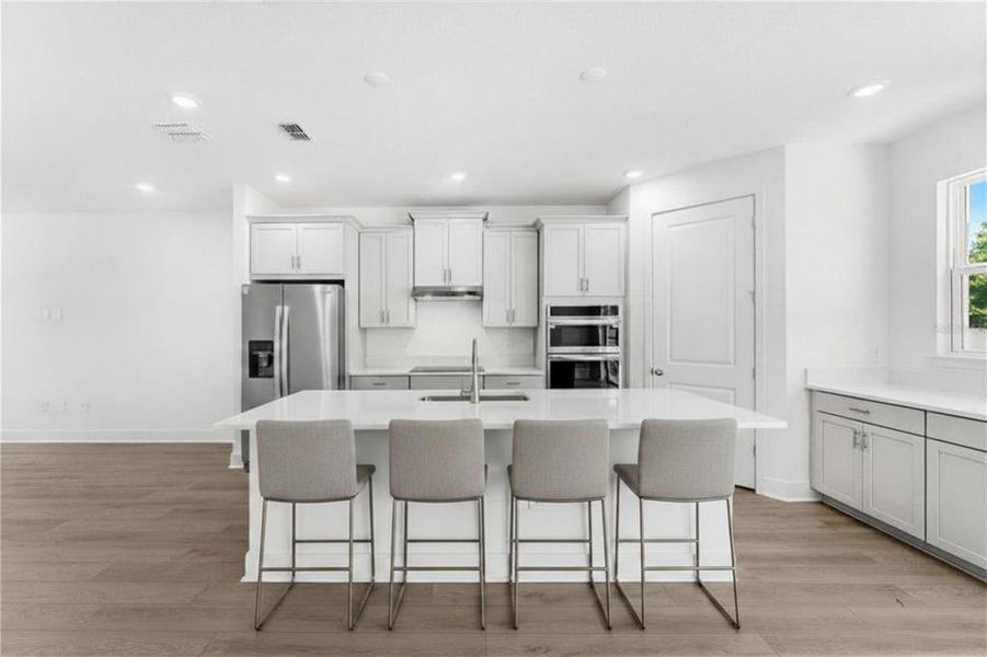 Furnished interior view inside a new home in Wekiva Springs Cove, Apopka (Image 7).