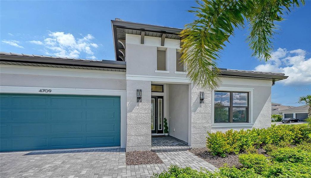 Exterior details and patio area of a home in , Sarasota (Image 28).
