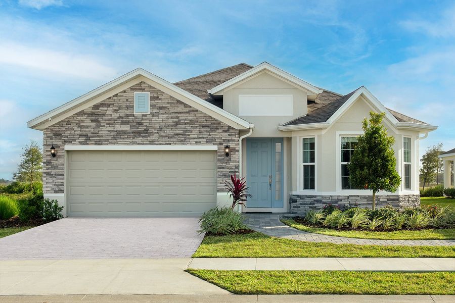 Representative exterior photo of a completed home built from the Hampton II by Park Square Residential in Highfield at Twisted Oaks, Wildwood, FL (Image 22). Representative exterior photo of a completed home built from the Hampton II by Park Square Residential in Highfield at Twisted Oaks, Wildwood, FL (Image 22).