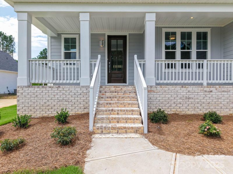 Front exterior of a new home in , Sherrills Ford, NC, highlighting curb appeal (Image 23). Front exterior of a new home in , Sherrills Ford, NC, highlighting curb appeal (Image 23).