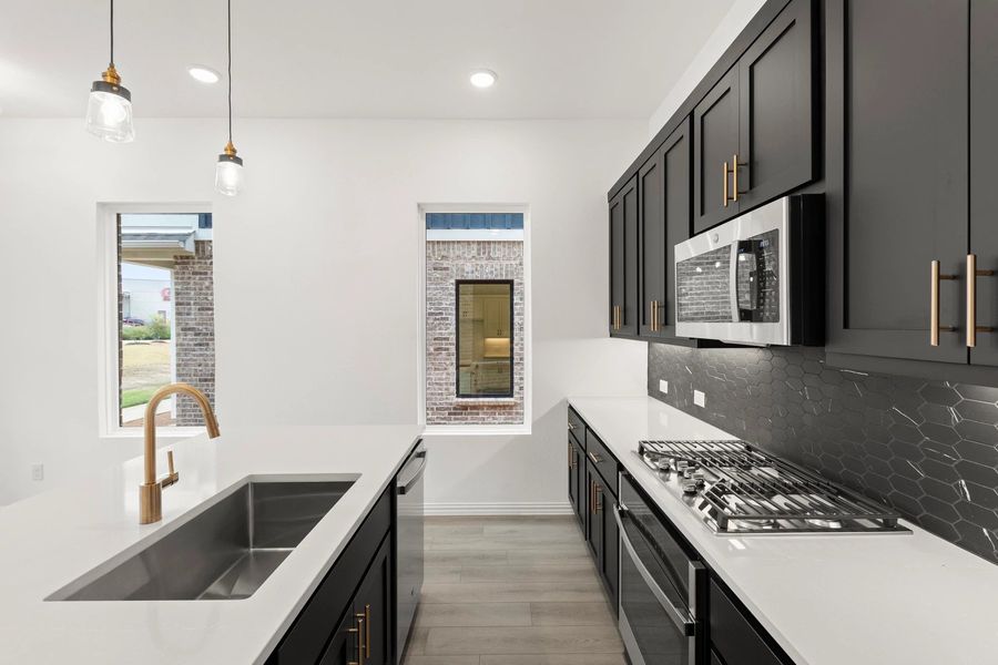 Kitchen featuring the Noir Collection Kitchen featuring the Noir Collection