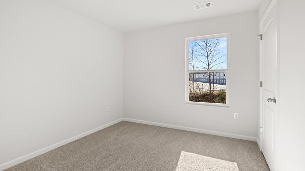 Spacious, unfurnished interior of a new home in Carlton, Douglasville (Image 18).