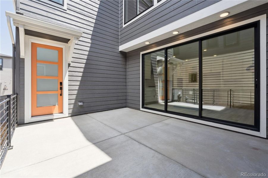 Front exterior of a new home in Storytellers at Lyric, Lone Tree, CO, highlighting curb appeal (Image 1).