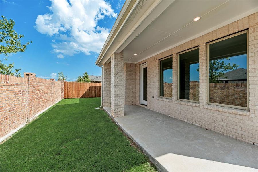 Front exterior of a new home in Villages of Hurricane Creek, Anna, TX, highlighting curb appeal (Image 21). Front exterior of a new home in Villages of Hurricane Creek, Anna, TX, highlighting curb appeal (Image 21).