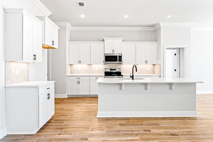 Furnished interior view inside a new home in Natureview, Freeport (Image 5).