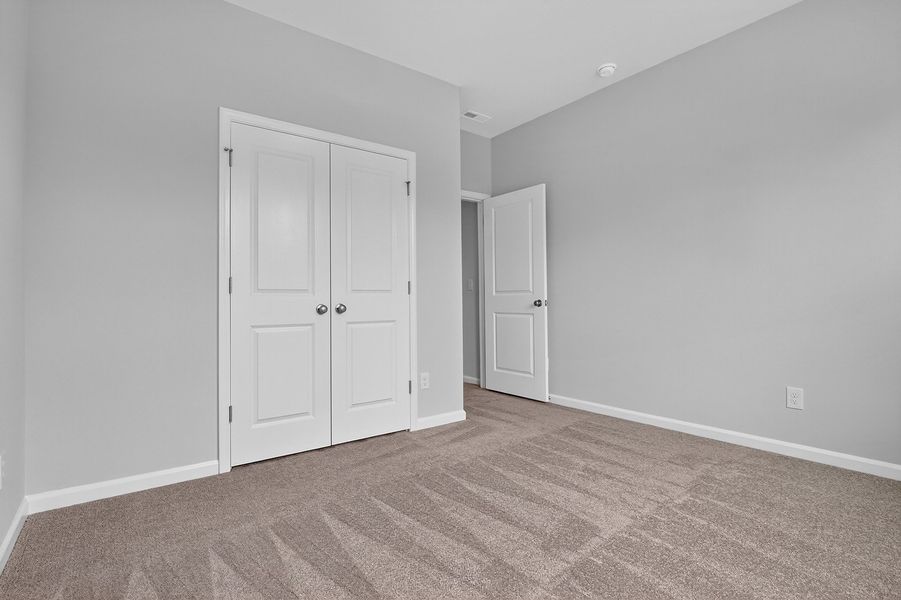 Spacious, unfurnished interior of a new home in Grand Park, Leland (Image 24). Spacious, unfurnished interior of a new home in Grand Park, Leland (Image 24).