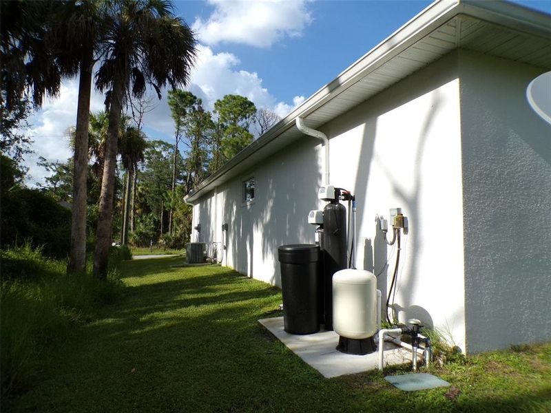 Exterior details and patio area of a home in , North Port (Image 29).