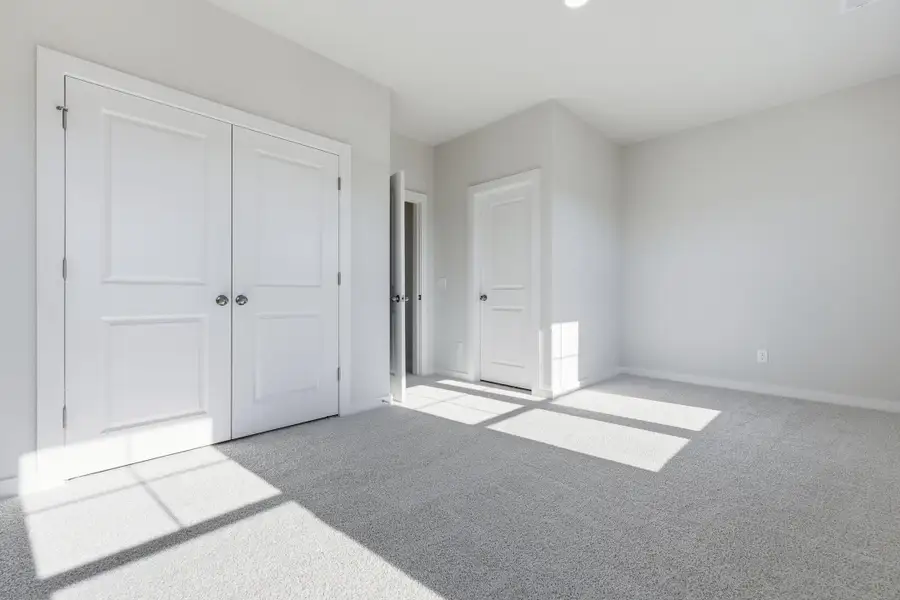 Spacious, unfurnished interior of a new home in Westpark at Cane Bay, Summerville (Image 21). Spacious, unfurnished interior of a new home in Westpark at Cane Bay, Summerville (Image 21).