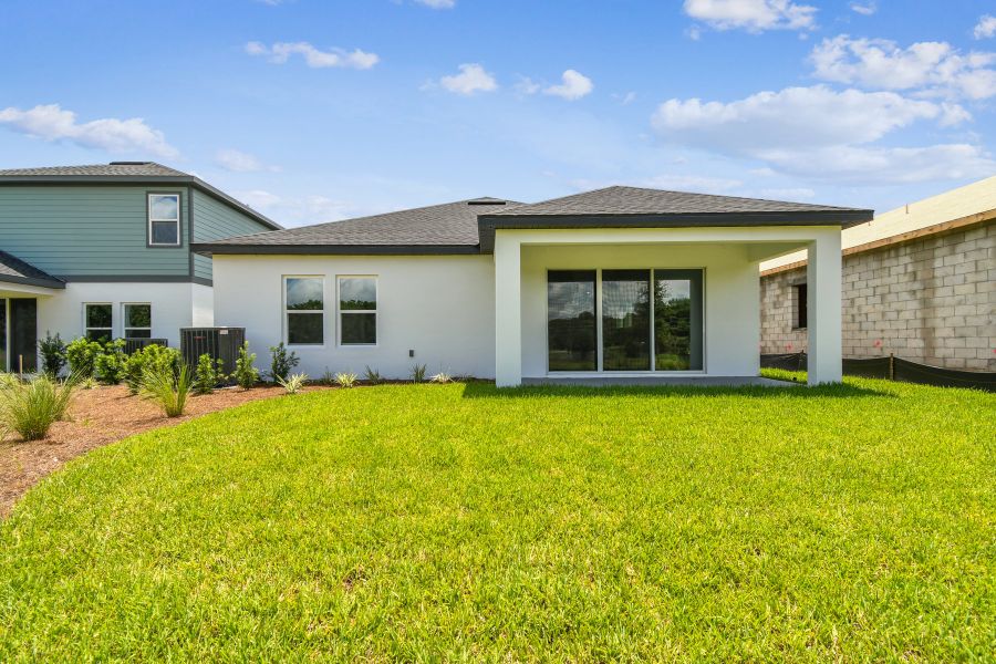 Representative exterior details of a home built from the The Sparkman by David Weekley Homes in Palmeras at Crossprairie – The Grove Collection, St. Cloud (Image 4).