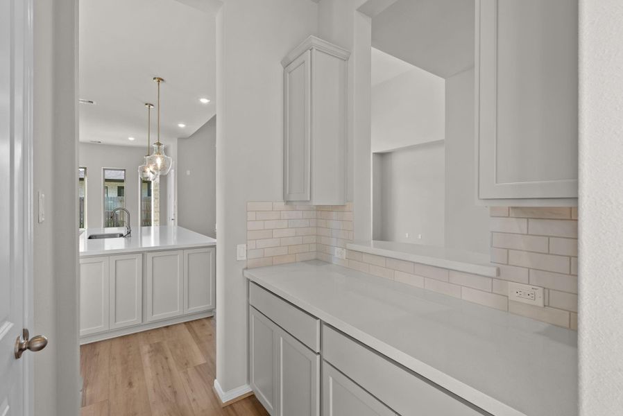 Furnished interior view inside a new home in , Conroe (Image 5).