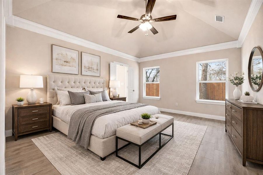 Bedroom featuring ornamental molding, ceiling fan, light wood-type flooring, and lofted ceiling