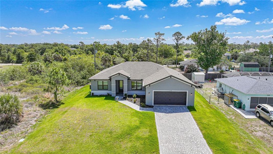 Front exterior of a new home in , Port Charlotte, FL, highlighting curb appeal (Image 29). Front exterior of a new home in , Port Charlotte, FL, highlighting curb appeal (Image 29).