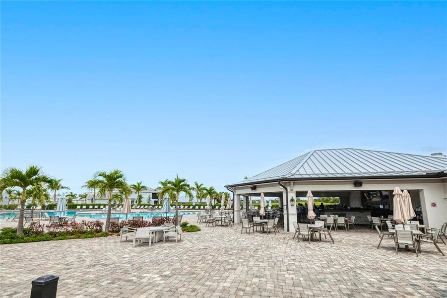 Front exterior of a new home in , Punta Gorda, FL, highlighting curb appeal (Image 1).