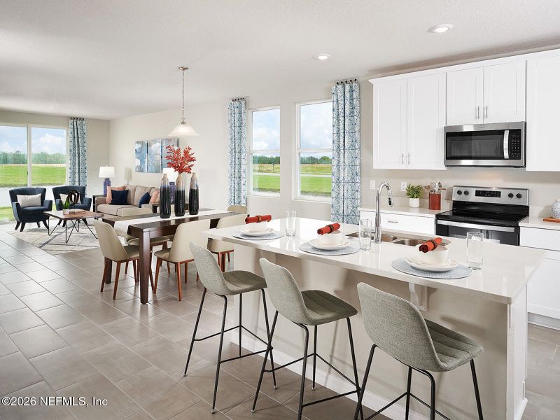 Furnished interior view inside a new home in Lakes at Bella Lago - Signature Series, Green Cove Springs (Image 6).