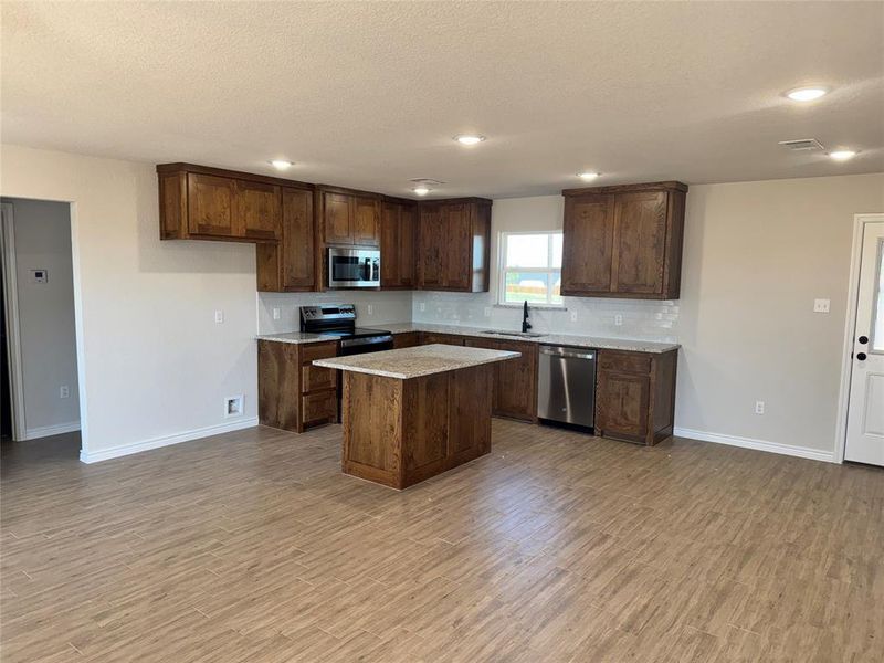 Furnished interior view inside a new home in , Poolville (Image 3).