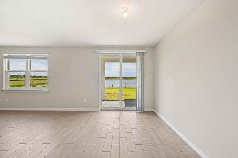 Furnished interior view inside a new home in Hampton Park - Classic Series, Vero Beach (Image 13).