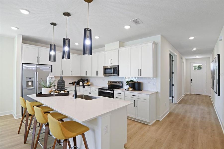 Furnished interior view inside a new home in Rye Manor at Legacy Preserve, Parrish (Image 14).