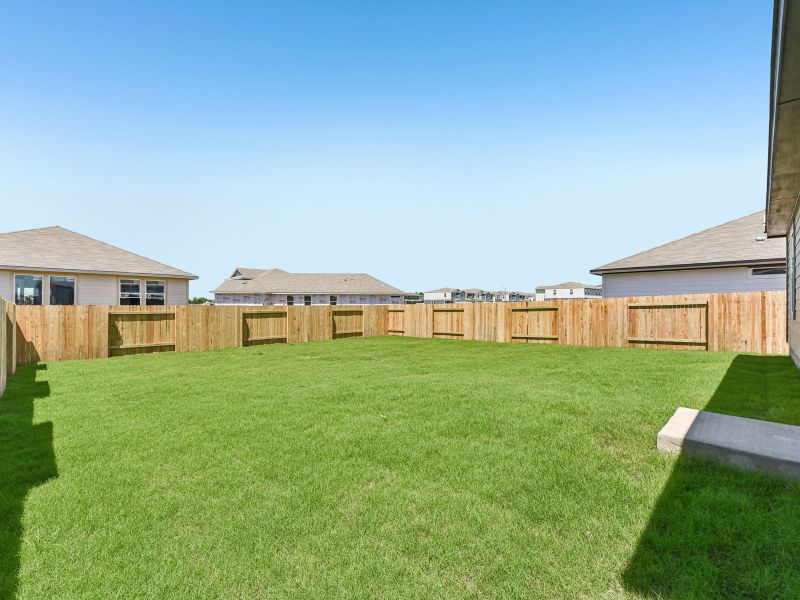 Exterior details and patio area of a home in Waterstone Crossing, Kyle (Image 2). Exterior details and patio area of a home in Waterstone Crossing, Kyle (Image 2).