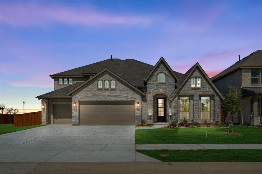 Front exterior of a new home in Glenwood Meadows, Argyle, TX, highlighting curb appeal (Image 26).