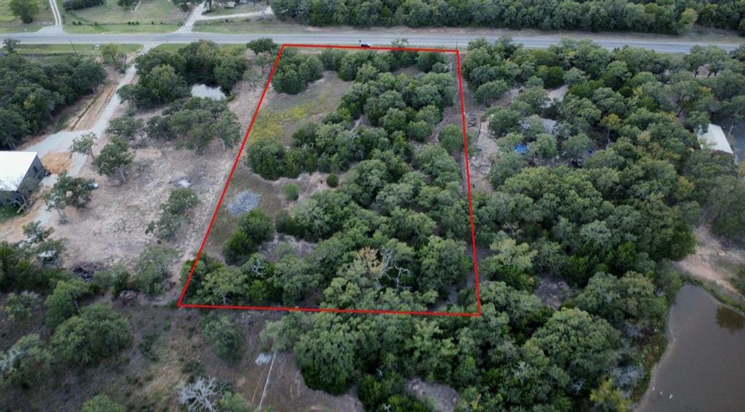 Aerial view - lines are approximate and reflect the property prior to building. Verify for accuracy.