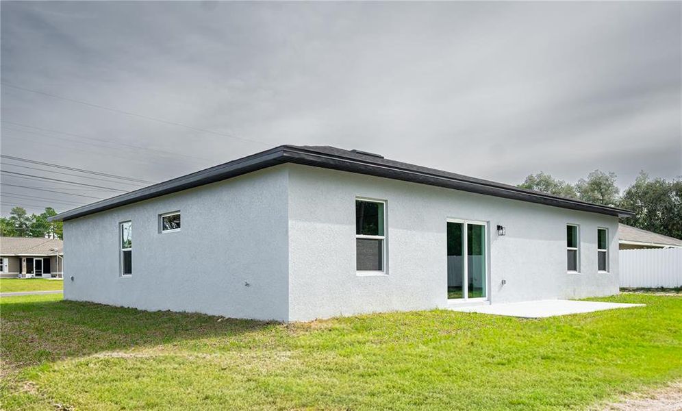 Exterior details and patio area of a home in , Ocala (Image 4).