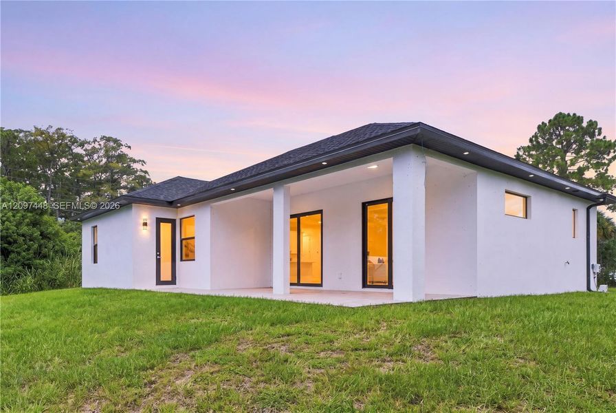 Exterior details and patio area of a home in , Lehigh Acres (Image 4).
