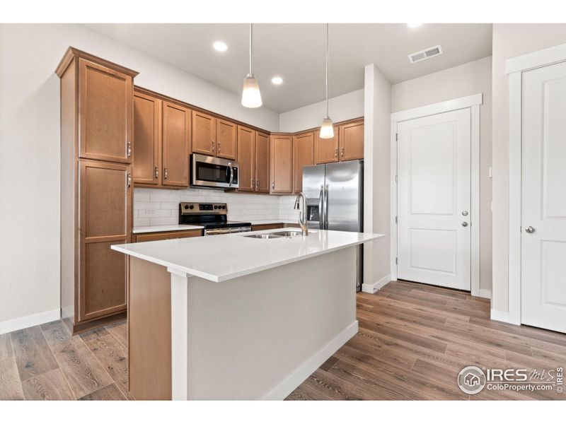 Furnished interior view inside a new home in The Lakes at Centerra - Discovery, Loveland (Image 6).