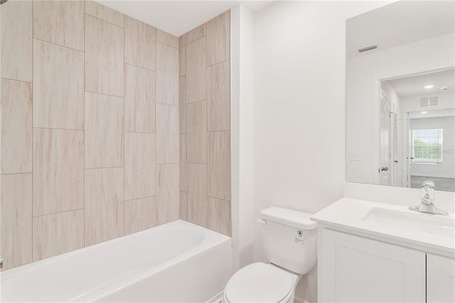 Furnished interior view inside a new home in Sol Vista, Dundee (Image 3).