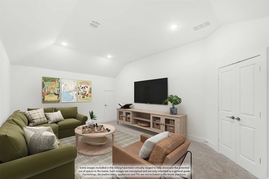 Living room with vaulted ceiling, green sofa, wall-mounted TV, and wood media console on carpet flooring