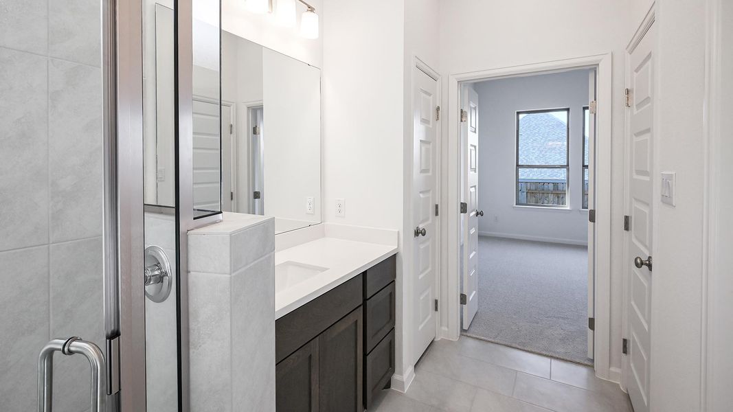 Furnished interior view inside a new home in Crosswinds 40', Kyle (Image 9).