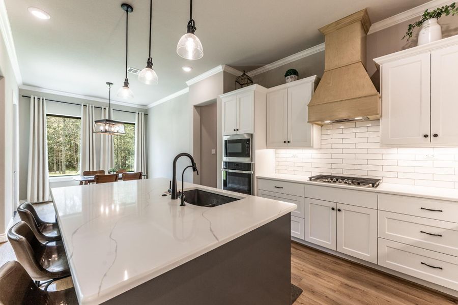 Blanco granite sink, 5 burner gas cooktop and electric wall oven & microwave