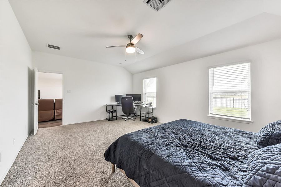 Furnished interior view inside a new home in Sunterra, Katy (Image 25).