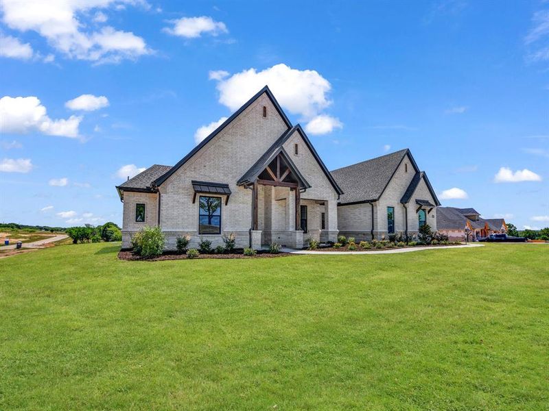 Front exterior of a new home in , Decatur, TX, highlighting curb appeal (Image 28).