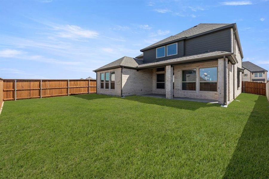 Exterior details and patio area of a home in Inspiration, Lucas (Image 27).